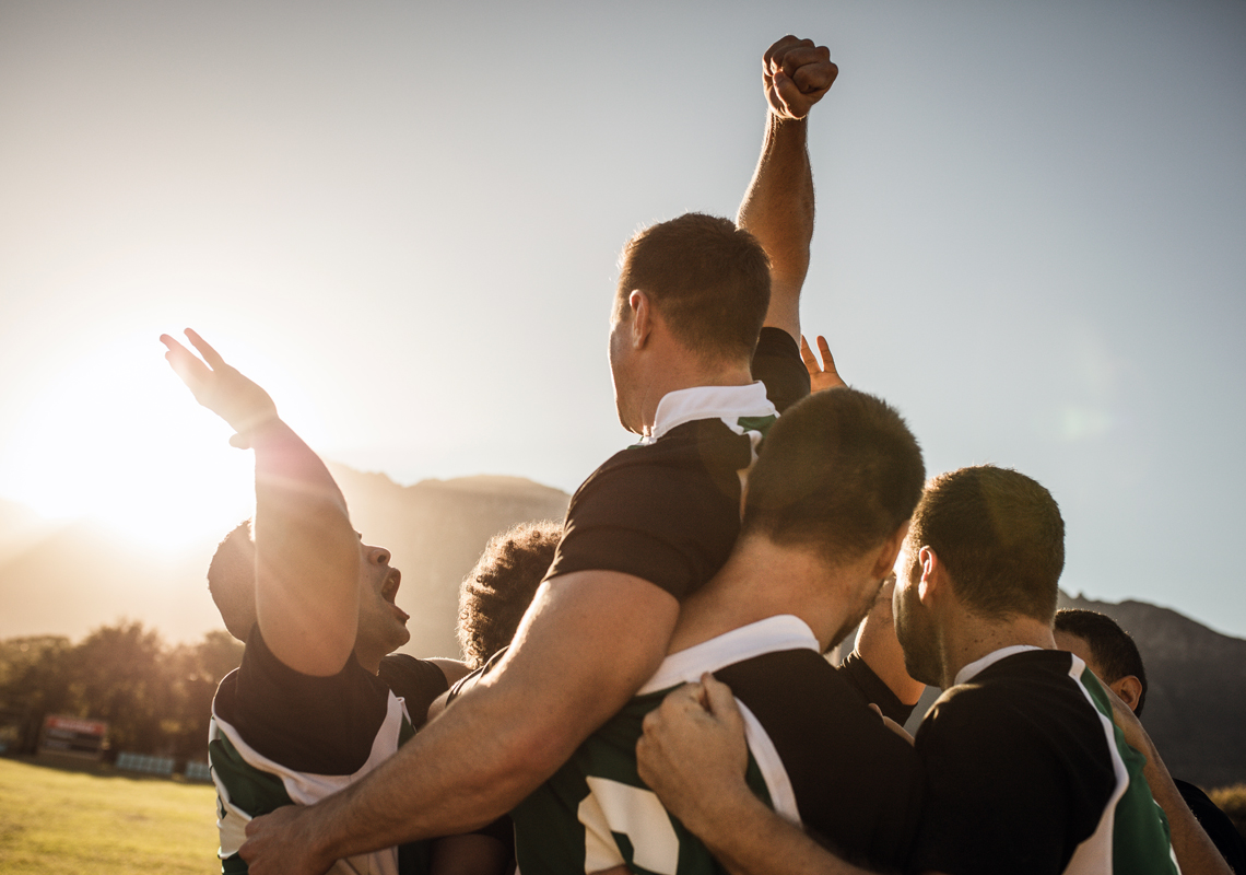 Groep mannen juicht - Ons team - Jan Krediet